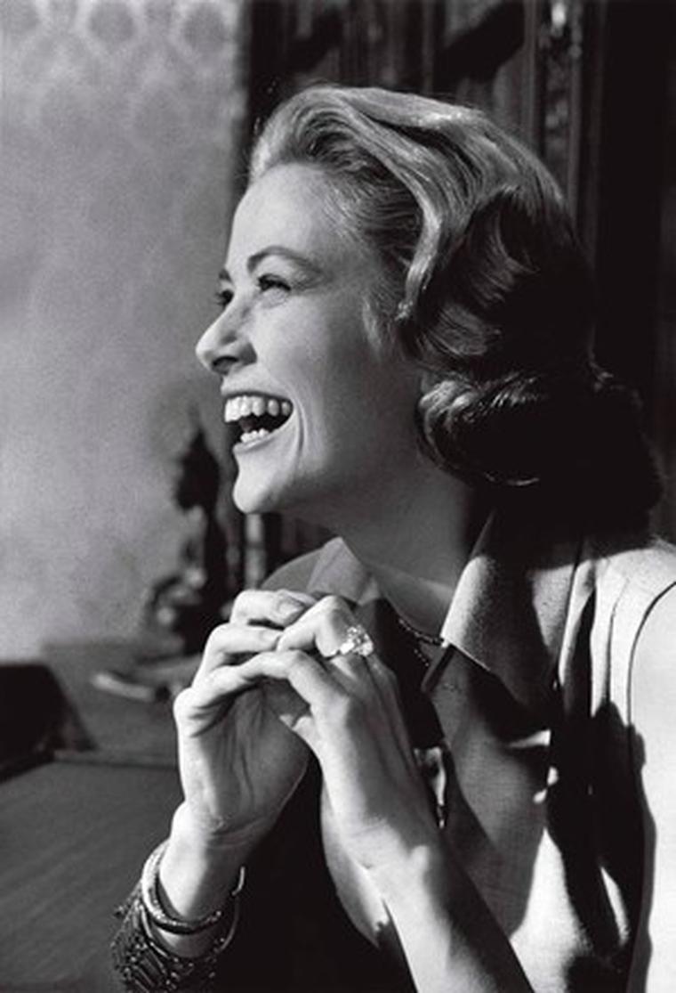 Princess Grace wearing her 10.47ct Cartier diamond engagement ring, given to her by Prince Rainier III.